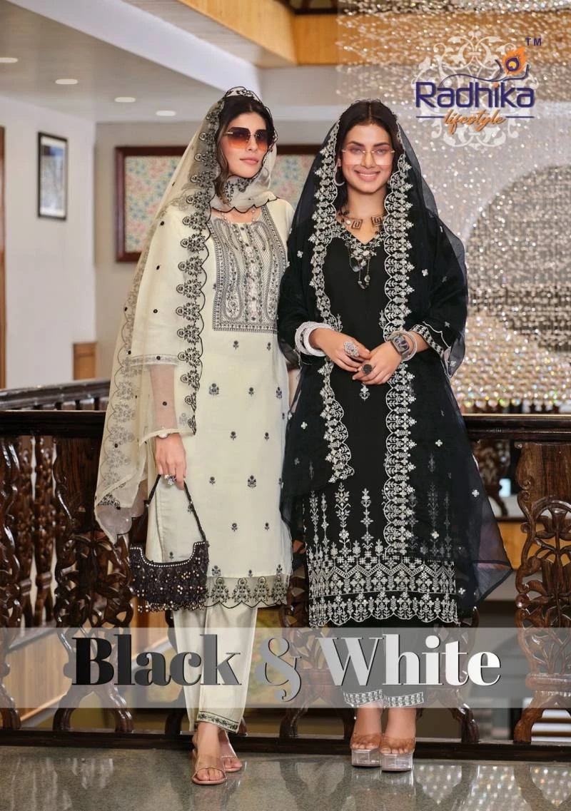 Radhika Silk Black And White Embroidery Kurti Pant With Dupatta